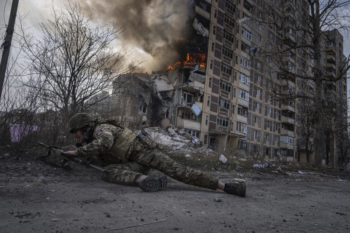 How Ukraine endures second year of war with scenes of grief, suffering and also joy